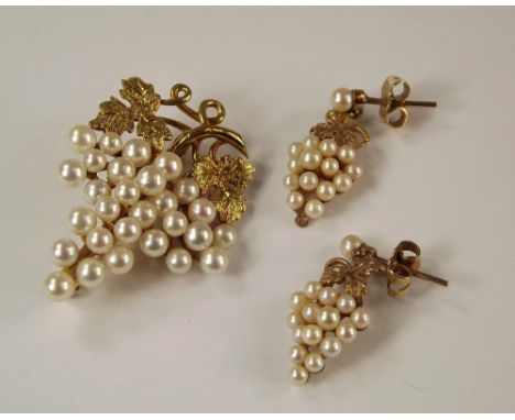 PEARL SET. A 9ct. gold &amp; cultured pearl fruiting vine brooch &amp; a pair of 9ct. gold mounted matching ear drops.