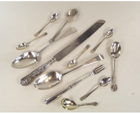 SILVER FLATWARE.Miscellaneous Georgian & later flatware, including a silver gilt caddy spoon, a Hatfield Rifle Club spoon & a