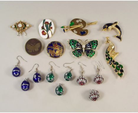 COSTUME JEWELLERY.Enamelled costume jewellery including three sets of enamel & paste egg pendants & earrings, an enamelled ar