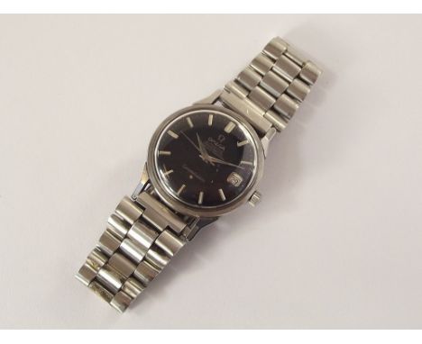 OMEGA AUTOMATIC.A gentleman's stainless steel cased Omega Constellation automatic chronometer wristwatch, c.1964. The black d