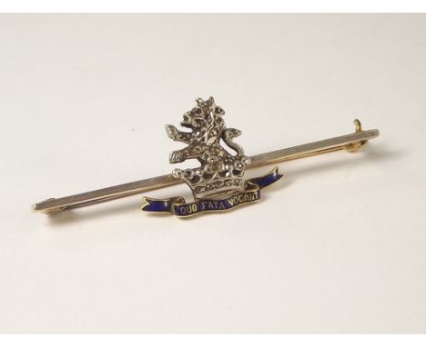 SWEETHEART PIN.A 7th Princess Royal's Dragoon Guards sweetheart pin, set with blue enamel, diamonds & a ruby.