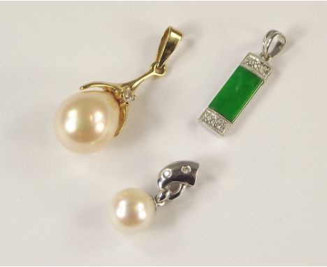 PEARL PENDANTS. An 18ct. gold cultured pearl pendant, the white gold mount set with two diamonds, a silver gilt faux pearl pe