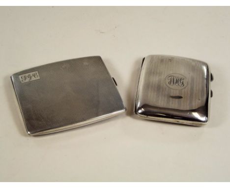 CIGARETTE CASES. A 1930's engine turned cigarette case &amp; one earlier smaller case.