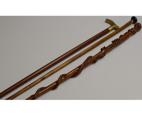 34½" OLD CARVED WOODEN WALKING STICK WITH THE HANDLE MODELLED AS A FEMALE FIGURE WITH OTHER DETAILING DEPICTING VARIOUS ANIMA