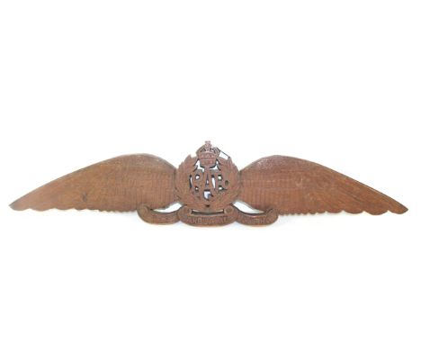 A bespoke carved pair of R.A.F. wings approx. 42" across, an impressive item