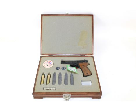 A Walther CP88 .177 Cal Co2 air pistol. This near mint example has a wooden fitted case, two magazines and pellets etc.
As a 