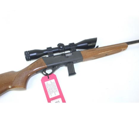 An Anschutz model 525 .22 Cal. self loading rifle Ser.No.146400. Complete with 4 x 40 scope. In overall excellent condition.
