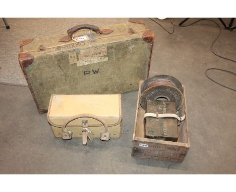A small wooden crate containing a tin marked "Rations", reel of wire with a leather covered tool box marked W.D. and a vintag