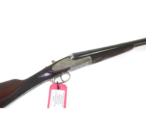 A 12 bore S.L.E. shotgun by Sabel Ser.No.98608. 27" barrels with good bores in overall good condition.
This item can only be 