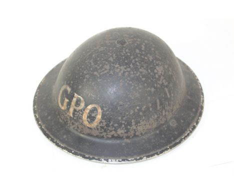 A WWII era Home Front G.P.O. steel helmet 