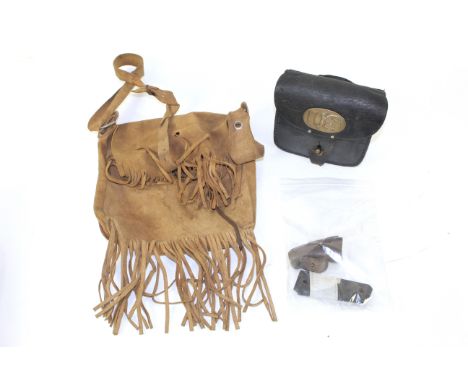 A U.S. Western style leather bag, with an ammunition pouch having brass U.S. badge to front; together with some pistol grips 