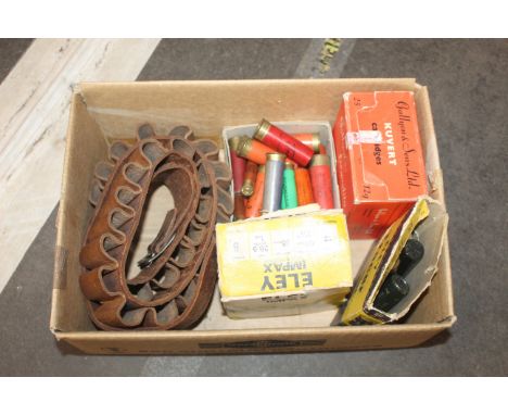 A quantity of mixed shotgun cartridges with a leather cartridge belt.
This item can only be purchased by someone with a curre