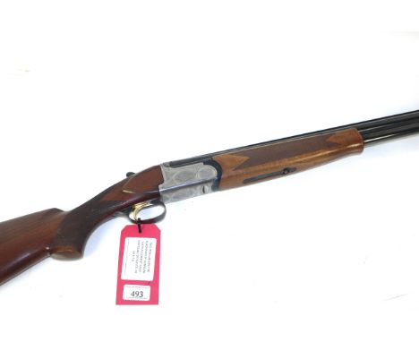 A 12 bore over / under shotgun by Parker Hale Ser.No.4171355, 28" barrels with good bores, single trigger and selective safet