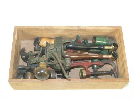 Four shotgun cartridge re-loading tools with two shot measures 