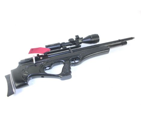 An Air Arms .22 S410-SL Xtra FAC P.C.P. air rifle, with a Hawke 3-9 x 50 scope also cut for moderator. This example has the c