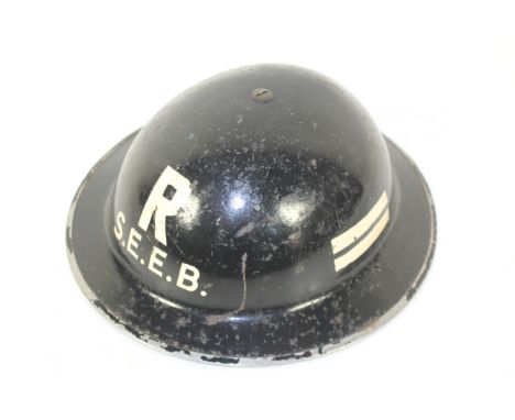 A WWII era Home Front S.E.E.B./ R South Eastern Electric Board rescue steel helmet