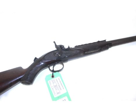 A monkey tail rifle by Westley Richards Co. with named lock and 1875 within triangle. This AF example is a scarce sporting st