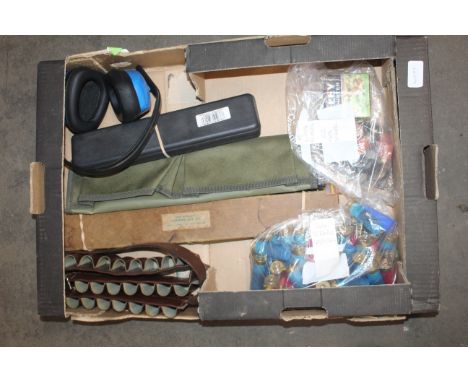 A mixed lot including cleaning kits, cartridge belt etc with an assortment of cartridges including .410 and 12 bore blanks.
T