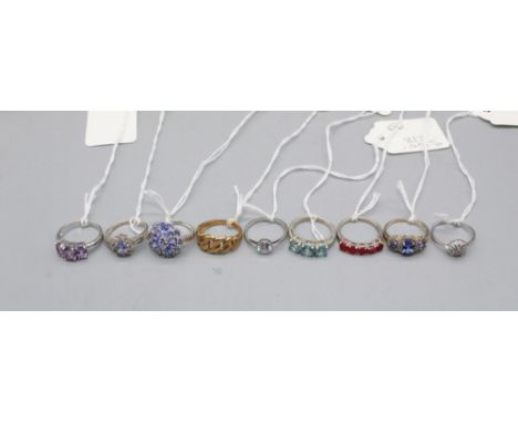 Nine silver rings with various gemstones, incl, silver ring set with a tanzanite cluster, silver gilt ring set with blue topa