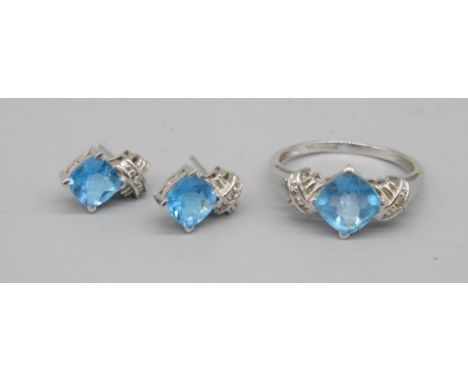 9ct white gold single stone blue stone ring, stamped 375, and a pair of matching earrings stamped 9k, 4.0g (5) 