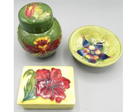 Moorcroft Pottery: 'Hibiscus' pattern rectangular trinket box and cover, red flowers on yellow ground, L9.5cm; 'Columbine' pa