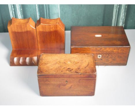 Georgian mahogany tea caddy with shell inlay, a Victorian rosewood sewing box and a pair of mahogany bookends 