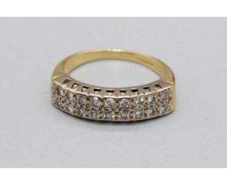 18ct yellow gold ring set with two rows of diamonds, stamped 750, size Q, 5.2g 