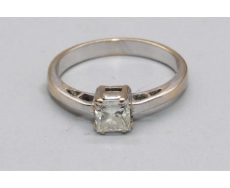 18ct white metal diamond solitaire ring, the square cut diamond in claw setting, approx. weight 0.41ct, unmarked, 3.0g 