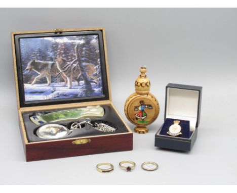 Two 9ct gold black stone rings and another ring stamped M &amp; S, a boxed souvenir Wolf pocket knife and pocket watch and an