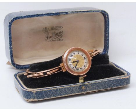 Ladies Swiss rose gold wristwatch on matching rose gold expanding bracelet stamped 9ct, two tone dial with engine turned cent