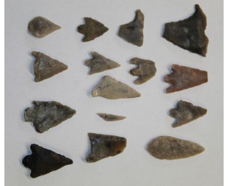 Large collection of  Neolithic arrow heads, microliths, scrapers found in Britain, and a nice example of a stone axe head fou