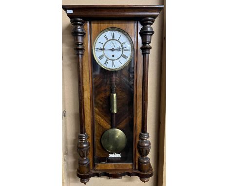 Early C20th continental walnut Vienna wall clock, full length glazed door enclosing 7 1/2" stepped two piece white enamel Rom