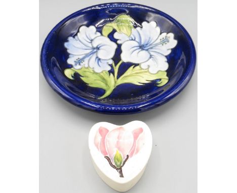 Moorcroft Pottery: 'Magnolia Flowers' pattern heart-shaped trinket box, pink flower on cream ground, L7cm, and a 'Hibiscus' p