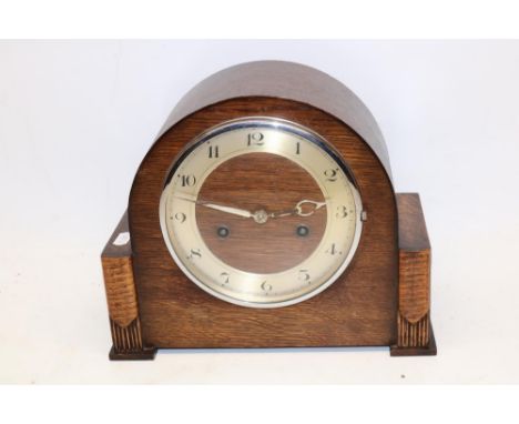 1930's H.A.C. oak striking mantel clock, chrome plated bezel enclosing silvered Arabic chapter ring, signed two train movemen