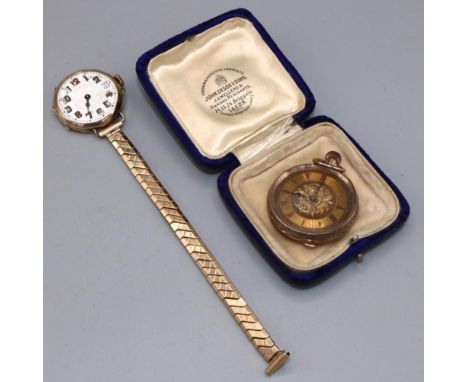 Swiss gold keyless pin set fob watch, engraved gold tone dial with Roman chapter ring, bright cut case hallmarked 9K no. 3479