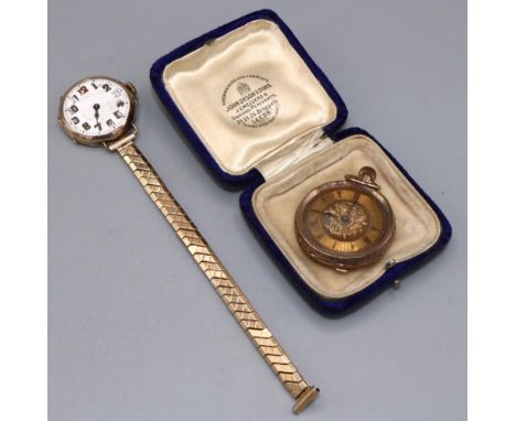 Swiss gold keyless pin set fob watch, engraved gold tone dial with Roman chapter ring, bright cut case hallmarked 9K no. 3479