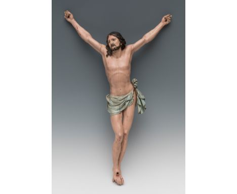 Neapolitan school; 18th century."Crucified Christ".Carved and polychrome wood.It presents faults in the carving and repaintin