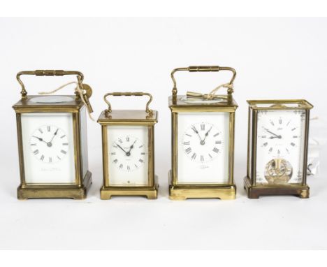 Four mid to late 20th Century carriage clocks, retailed by 'Mappin &amp; Webb' white enamel dial with Roman numerals, within 