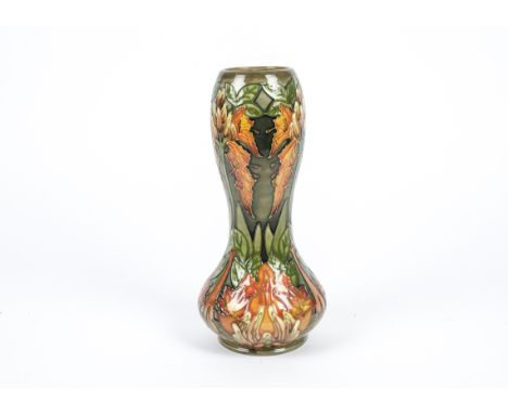 A Moorcroft pottery double gourd vase,  c1999 yet reminiscent of earlier Florian wares with highly stylised flowers, characte