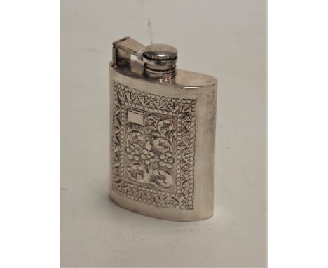 A 20th century white metal pocket hip flask, having floral repousee decoration and vacant cartouche, stamped Sterling Silver,