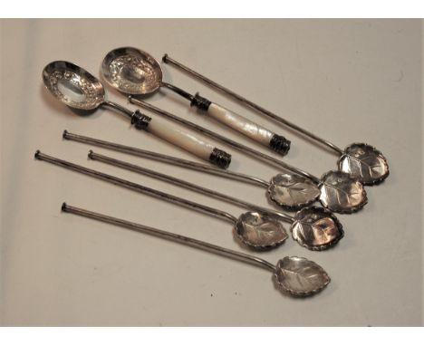 A set of six Spanish silver cocktail stirrers, each having leaf shaped bowl and plain stem; together with a pair of Victorian