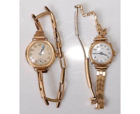 A vintage lady's 9ct gold cased mechanical wristwatch, having an unsigned silvered dial and Swiss fifteen jewel movement, on 