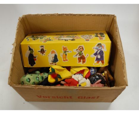 A boxed Pelham Giant puppet together with various loose Pelham Puppets.No major damage, but all are well-used.Some rips and s