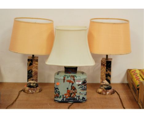 A pair of Art Deco veined marble square section table lamps each on circular domed footrim with shades, height 49cm including