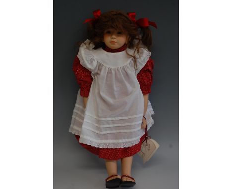 A modern Steiff bisque collectors doll Monika, limited edition No.158 of 300, having fixed brown eyes, painted freckles, and 