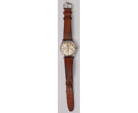 A gent's steel cased Omega Constellation automatic chronometer wristwatch, having singed champagne dial, baton markers, screw