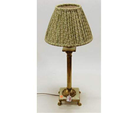 A lacquered brass Corinthian column table lamp on onyx base and further lacquered brass paw feet with pleated silk shade, hei