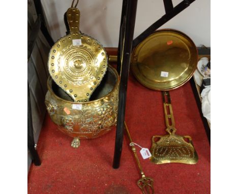 A collection of brassware, to include a set of bellows, warming pan, fire tools and coal bucket