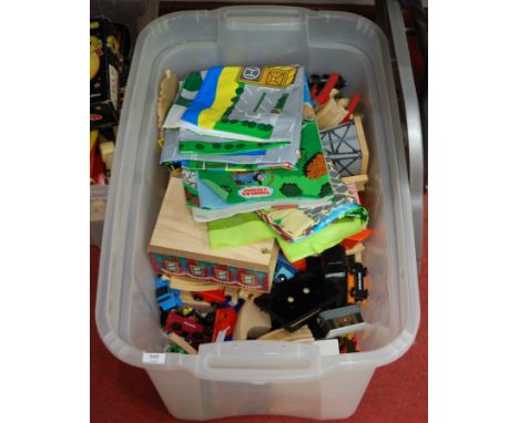 A collection of childrens toys, to include wooden Thomas the Tank Engine trains and track