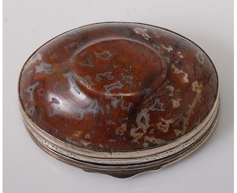 A George III white metal and moss agate snuff box, of oval form, the white metal mount to hinge cover with scroll leaf chased